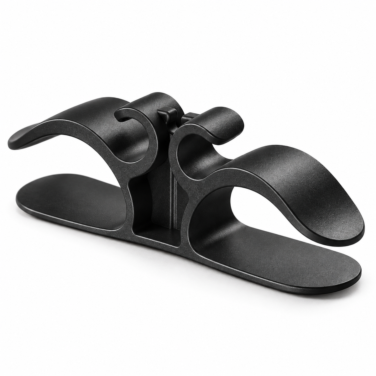 Black appliance cord organizer, right three-quarter view on white background